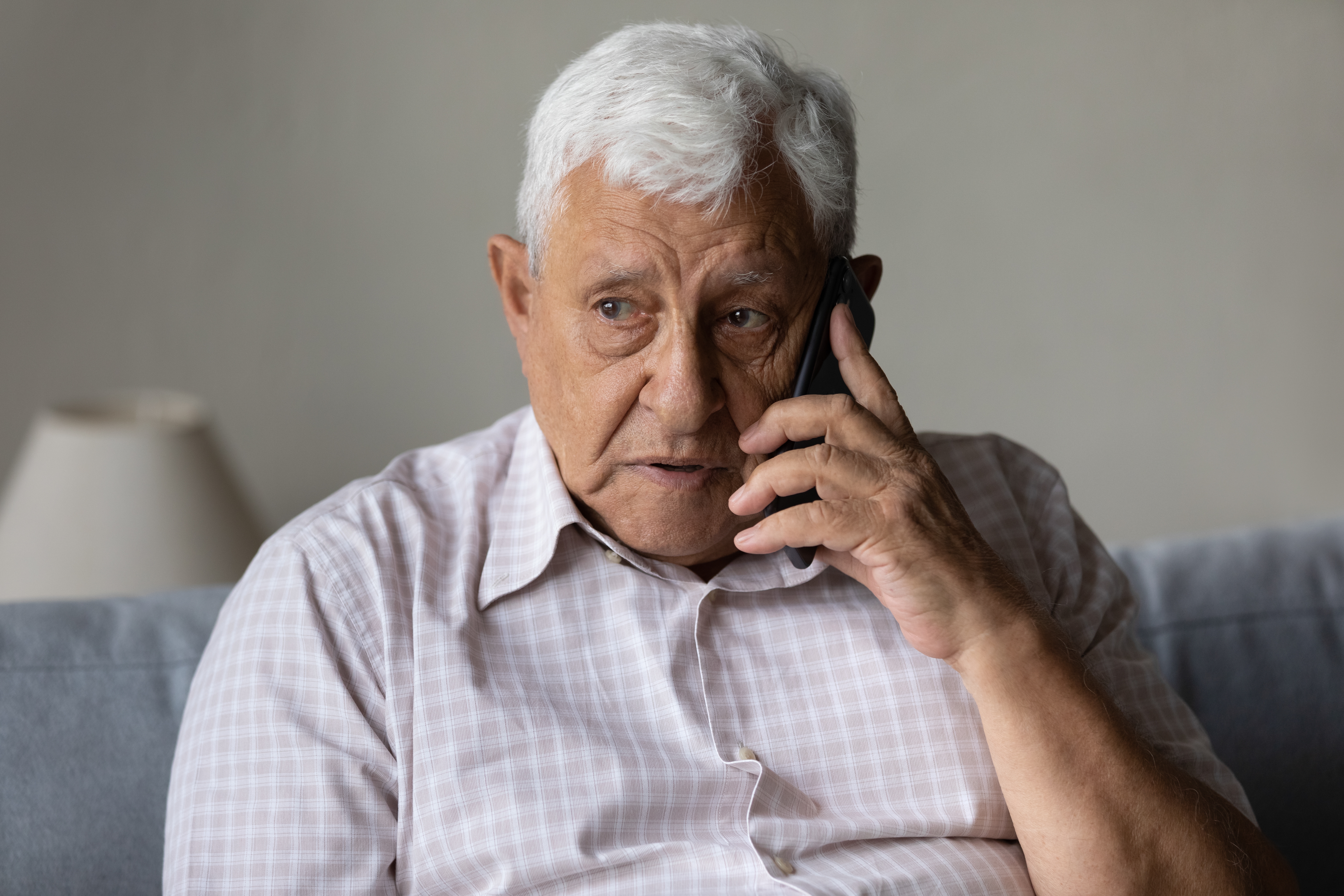 Serious,Concerned,Old,Grandpa,Talking,On,Mobile,Phone,,Calling,For
